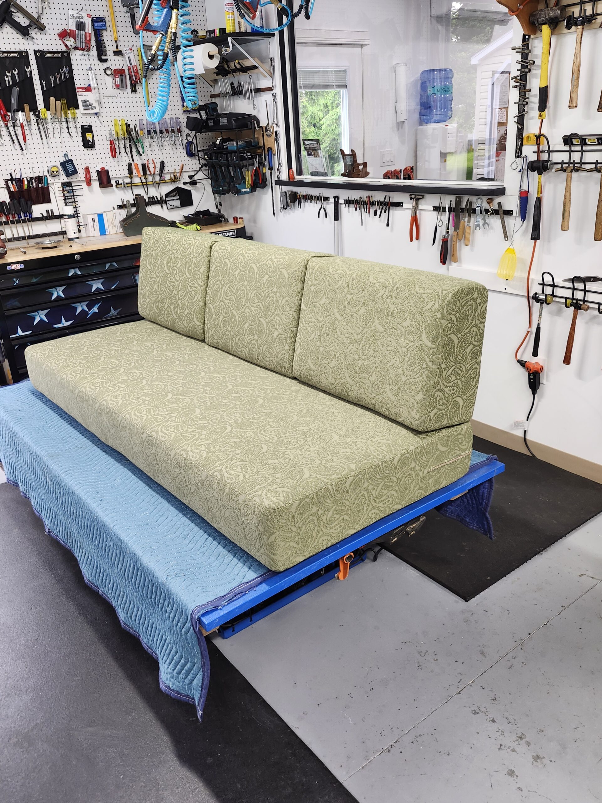 New sage green paisley cushions on 72-inch antique Mission settee completed at Alex Upholstery Shop serving Frederick MD