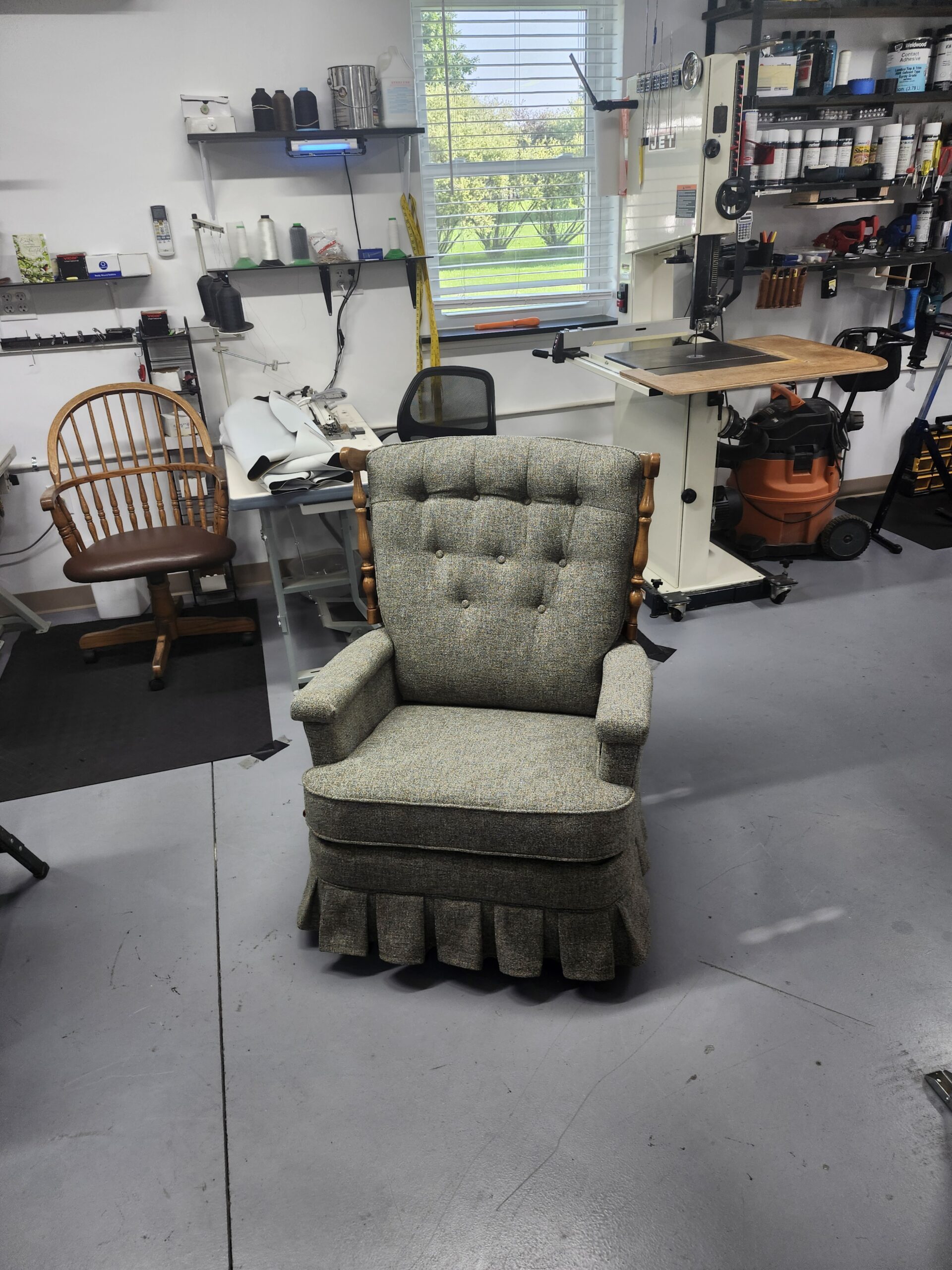 Recliner reupholstery Lebanon PA project: mid-century La-Z-Boy recliner finished in gray-green heathered tweed with a six button biscuit tufted back, padded arms, pleated skirt and turned wood posts, front view at Alex Upholstery Shop