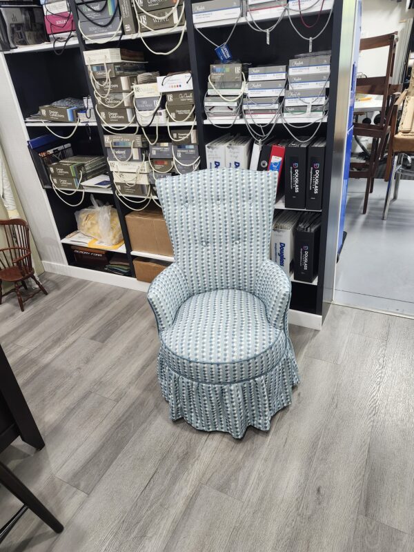 Chair Reupholstery Lititz PA | Mid-Century Round Slipper Chair 10 Chair reupholstery Lititz PA project: mid-century round slipper chair reupholstered in a light blue and white dotted stripe fabric with a five button tufted back, round welted seat and gathered skirt, in the Alex Upholstery Shop fabric showroom